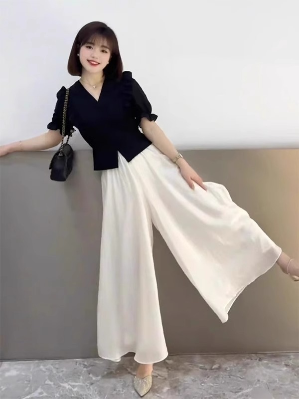 通勤穿搭赫本风法式小众黑色泡泡短袖上衣女夏独特超好看单穿小衫