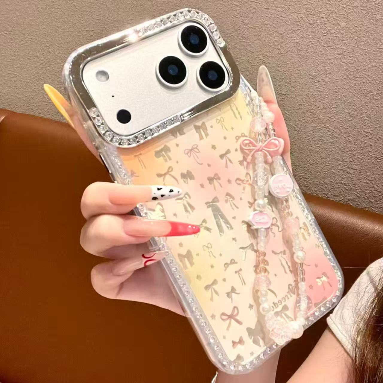 【自带相机保护按键】银色蝴蝶结手机壳适用于苹果17/16/15手机壳