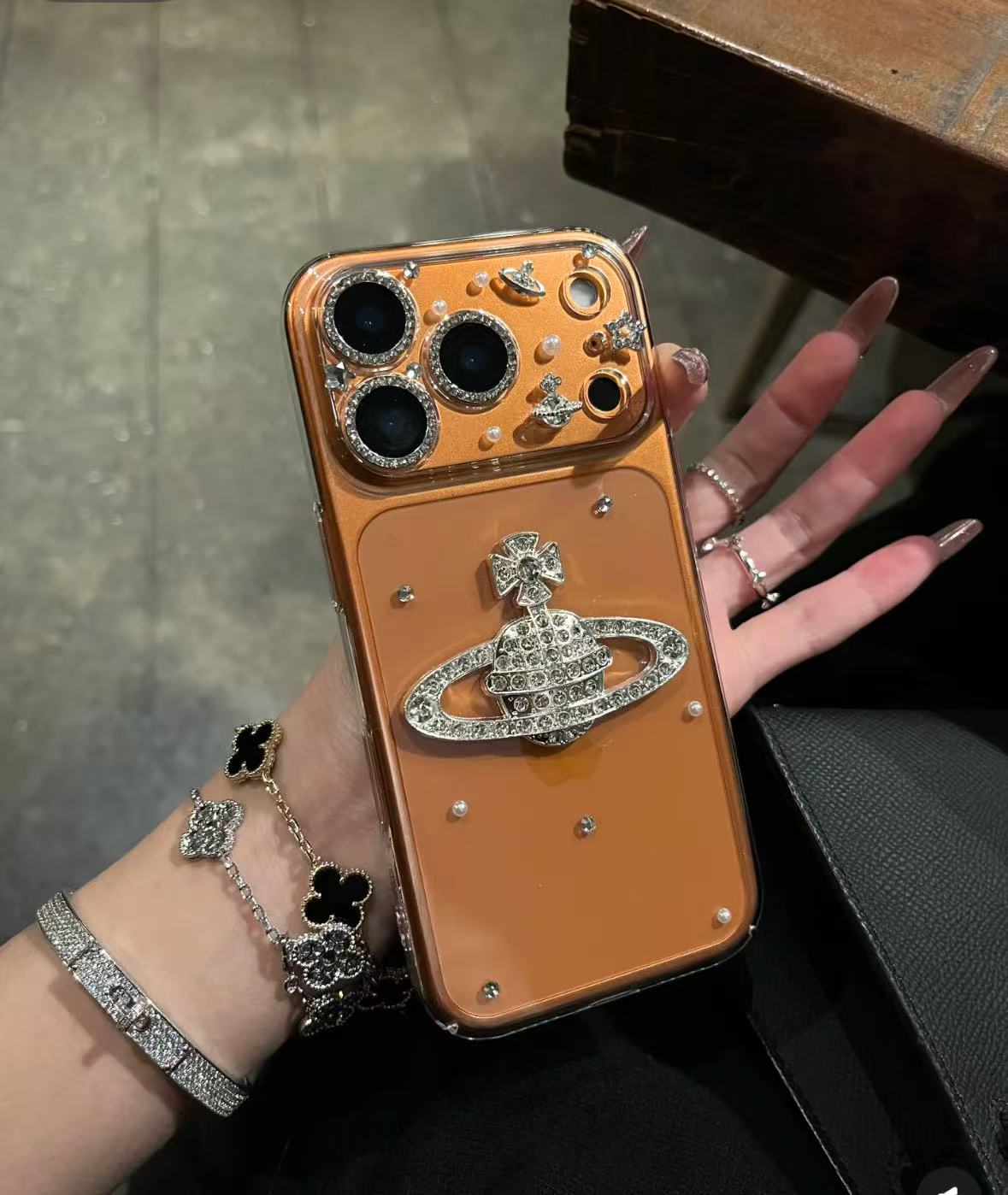 轻奢高级闪钻土星球猫耳手机壳适用17promax/16/15/14/13防摔女