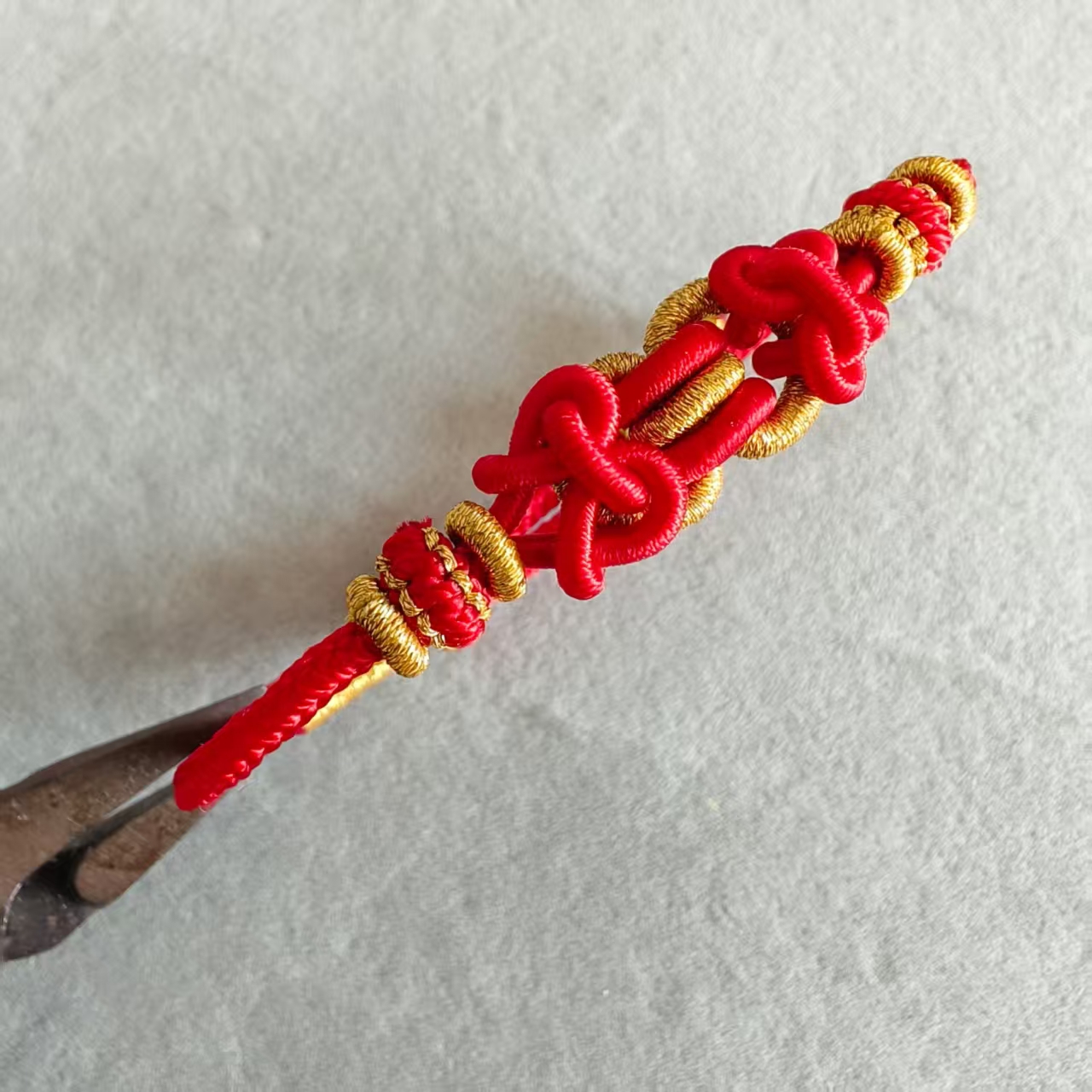 非金属布艺手链 2026年属马的本命年吉祥马鞍结红色手链编织手绳