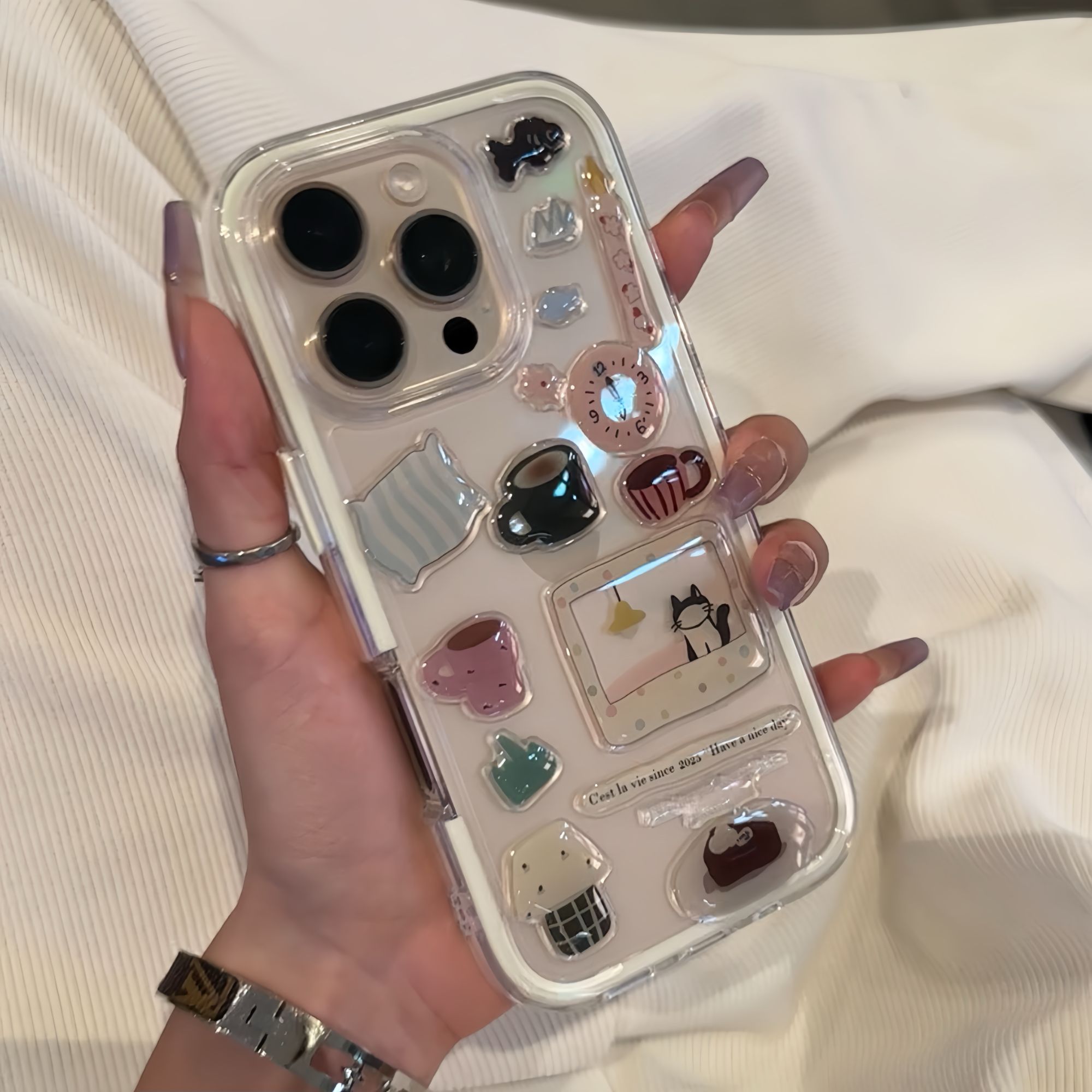 欧克里里闹钟小黑猫贴纸苹果16/15promax手机壳iPhone14/13/12/11