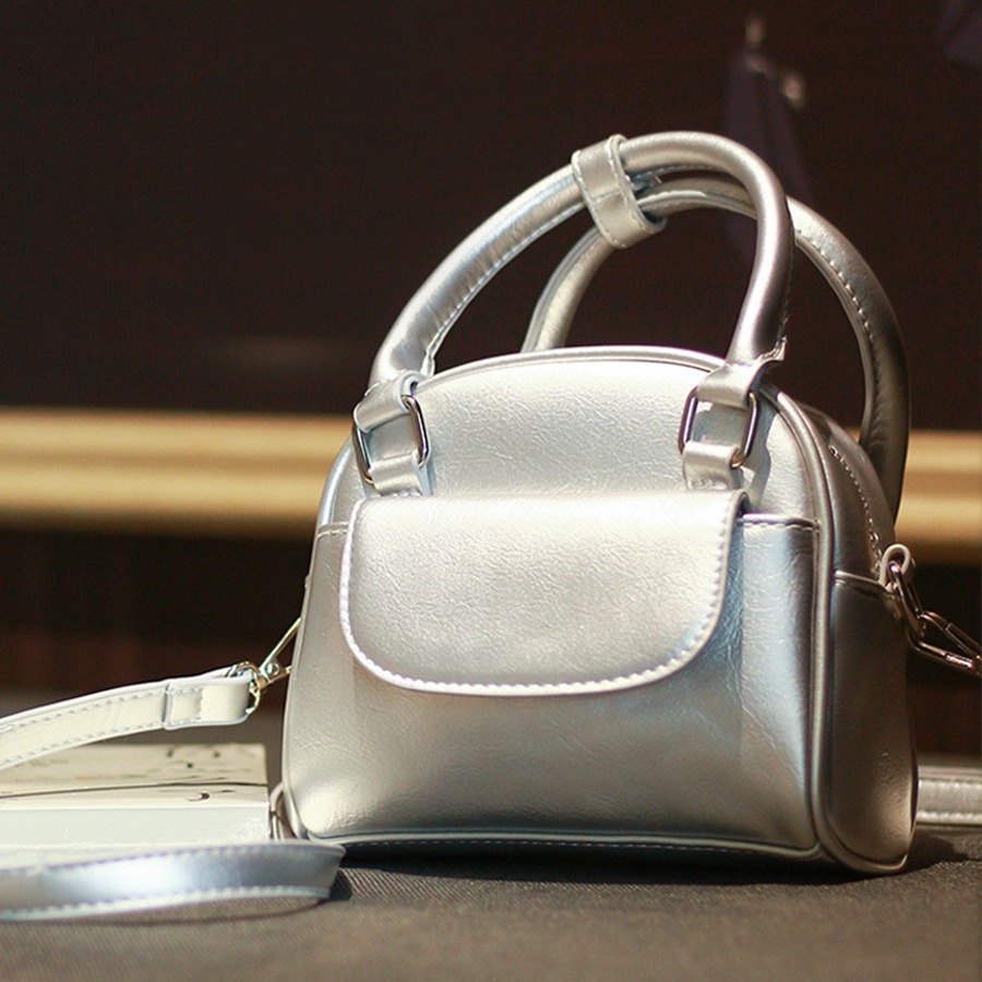 手提包包女2025新款韩国小众设计贝壳包复古百搭斜挎包手拎小方包