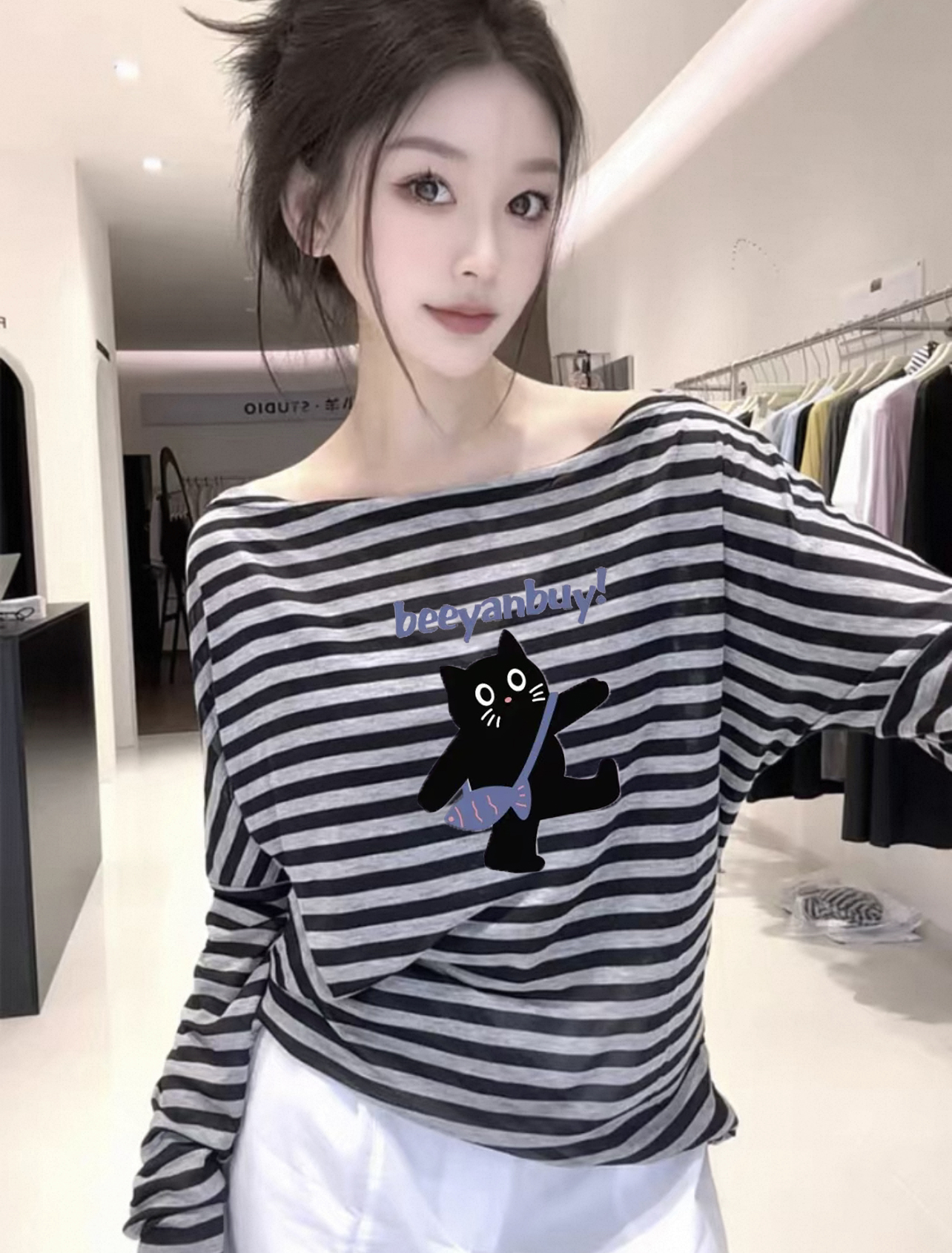 2025秋季新款韩版卡通印花条纹长袖T恤女宽松显瘦一字领露肩上衣