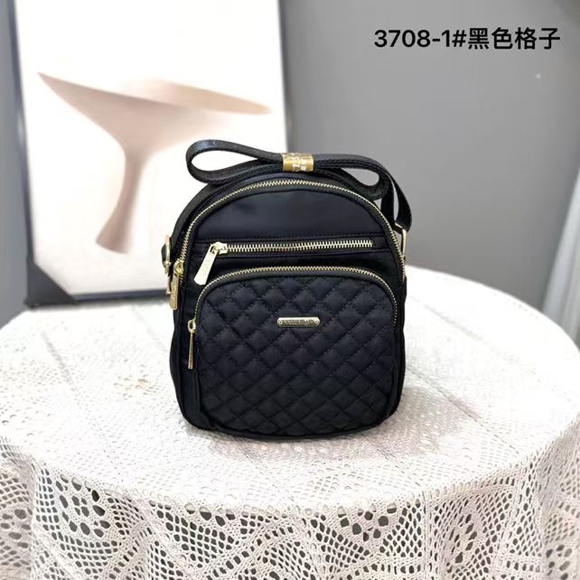 单根椭圆形拉链暗袋防刮斜挎包手机包韩版网红黑色休闲百搭小包包