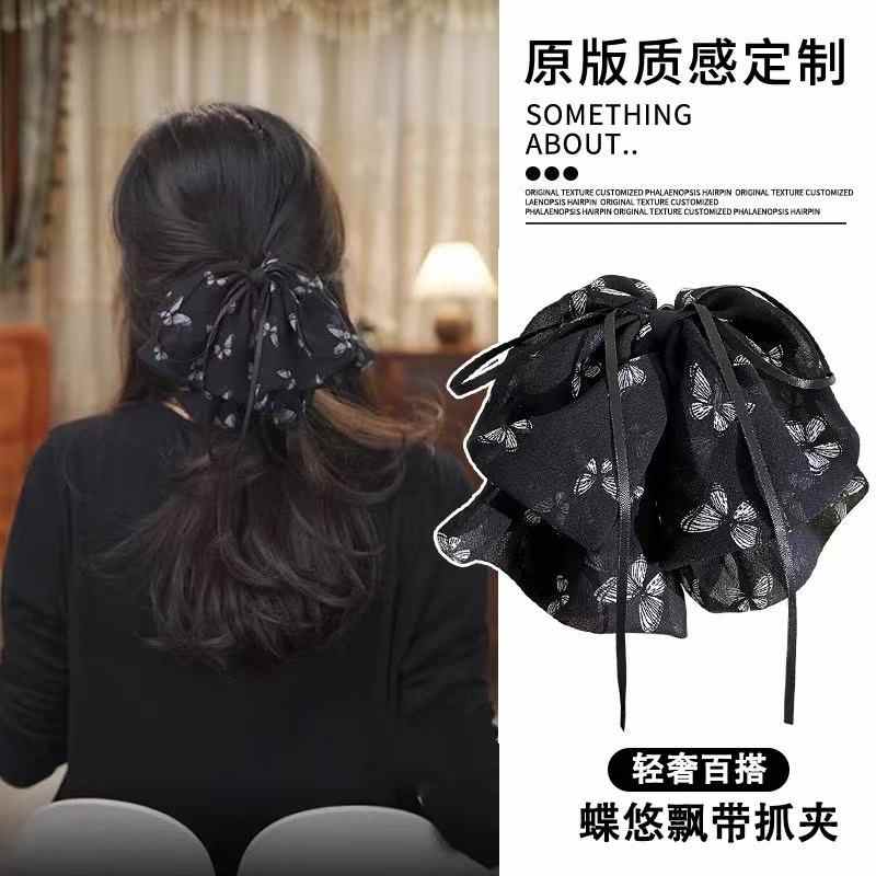 蝶悠蝴蝶结飘带抓夹女2025新款碎花发夹高级感鲨鱼夹后脑勺马尾夹