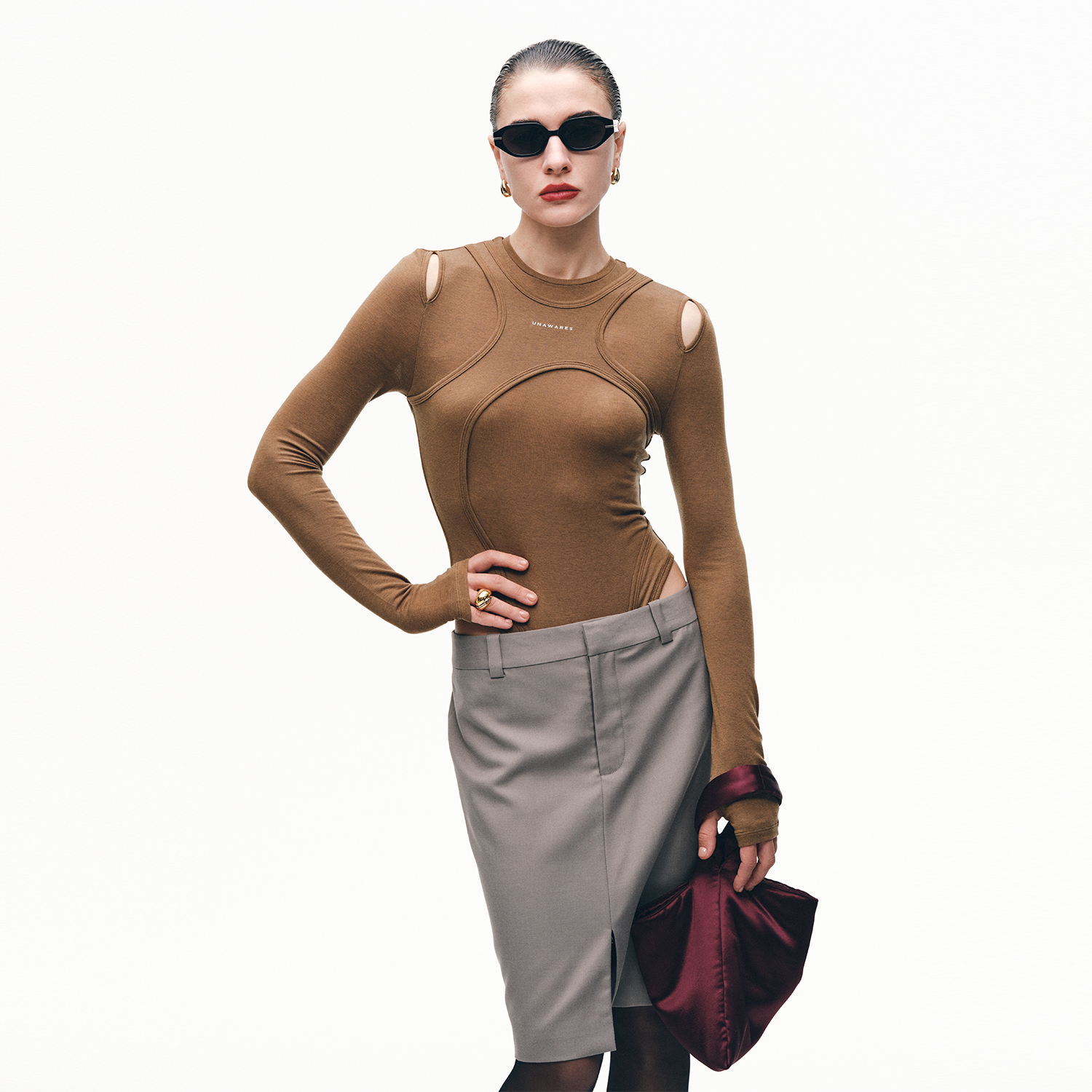 Unawares. 错位结构针织长袖连体衣