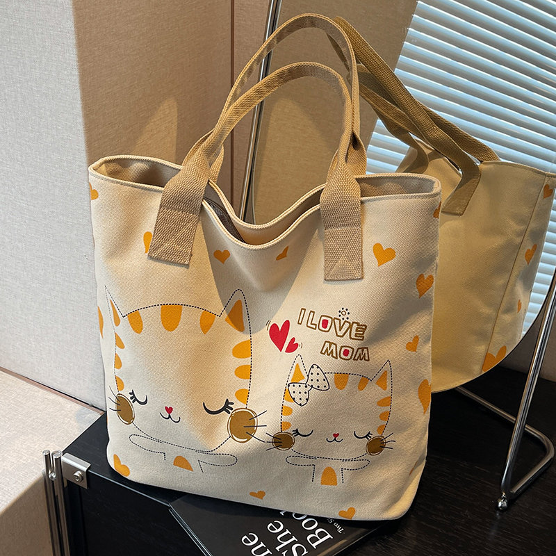 休闲大容量包包女夏新款卡通猫咪帆布包大学生上课通勤单肩托特包