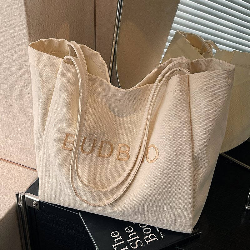 帆布包包女大容量2025新款春夏百搭单肩包文艺休闲学生上课托特包