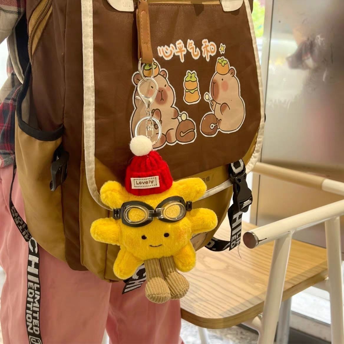 温暖的小太阳花包包挂件戴帽子公仔钥匙扣可爱精致小太阳花挂件