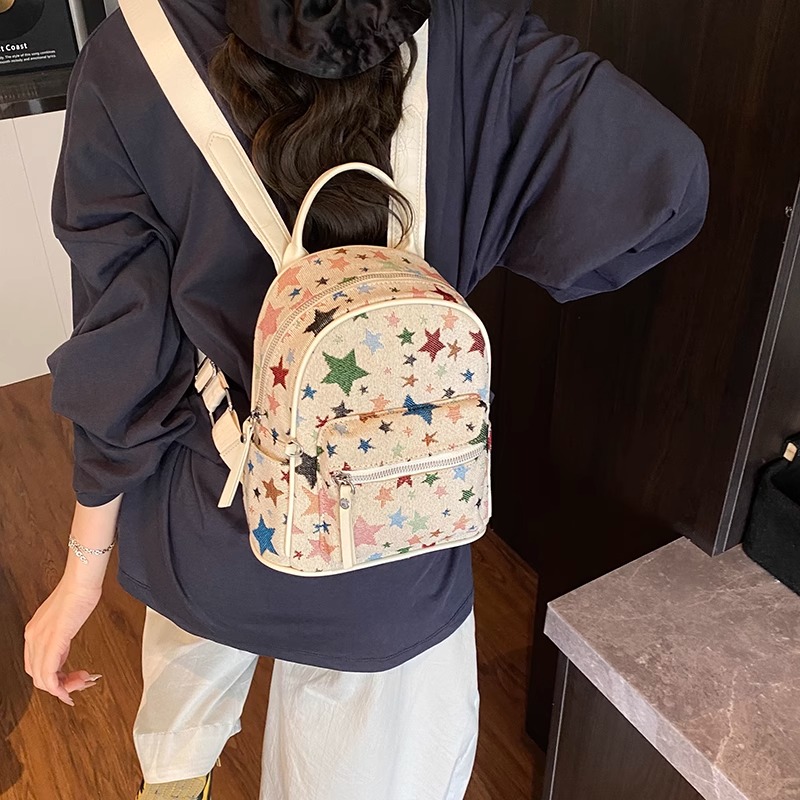 星星刺绣双肩包女2025新款时尚学院风帆布书包夏季百搭外出旅行包