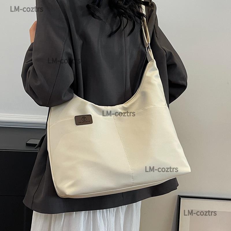 大容量斜挎包女2025新款夏季休闲单肩帆布包大学生上课通勤托特包