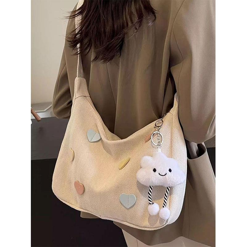 帆布包女2025新款潮秋冬简约百搭大容量单肩包休闲通勤斜挎饺子包