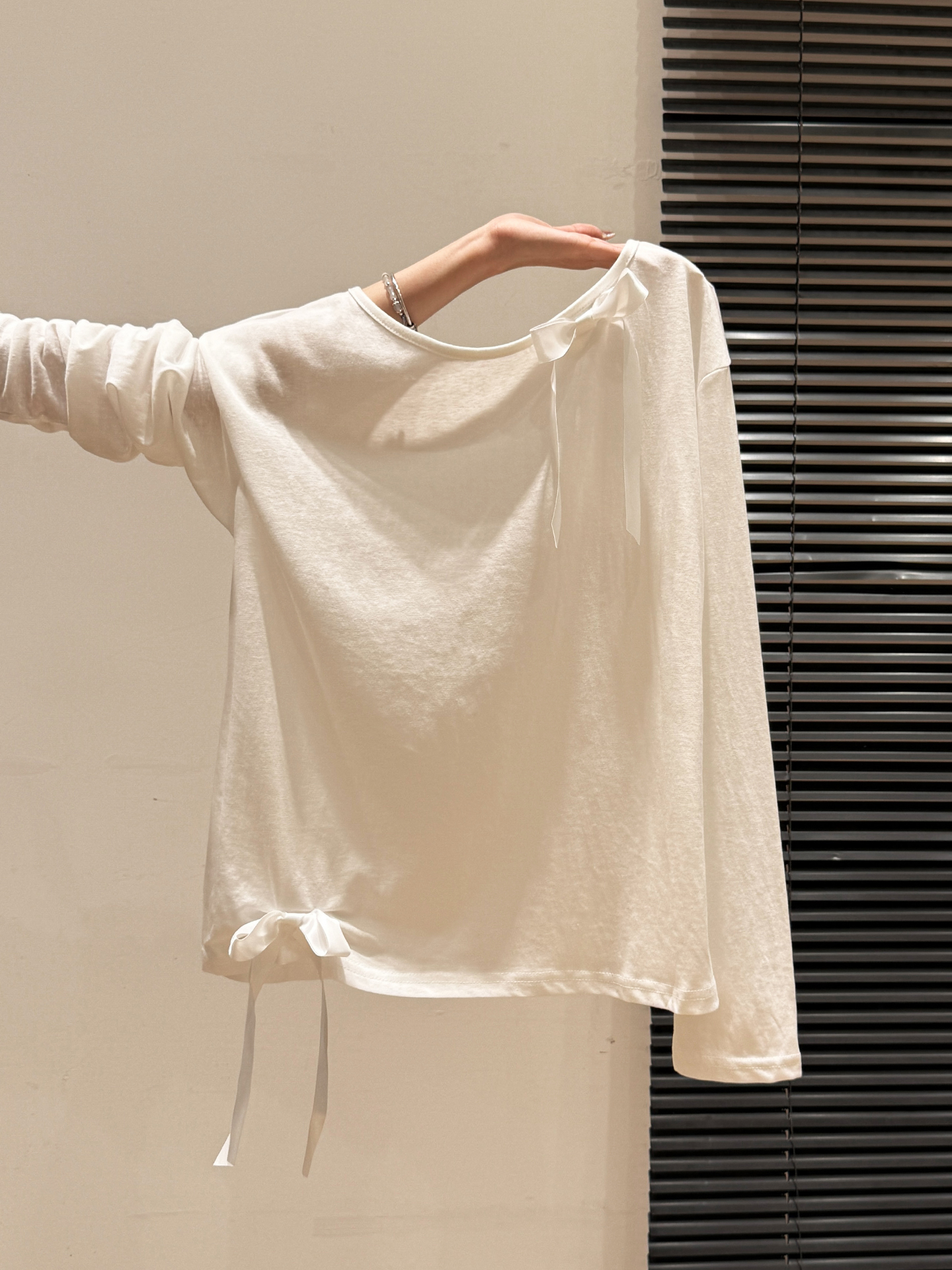 时髦设计感蝴蝶结装饰宽松显瘦长袖T恤女2025秋新款慵懒风上衣