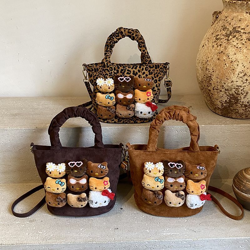 超火秋冬小豹纹女孩流行百搭单肩斜挎包可爱卡通猫咪手提水桶包X