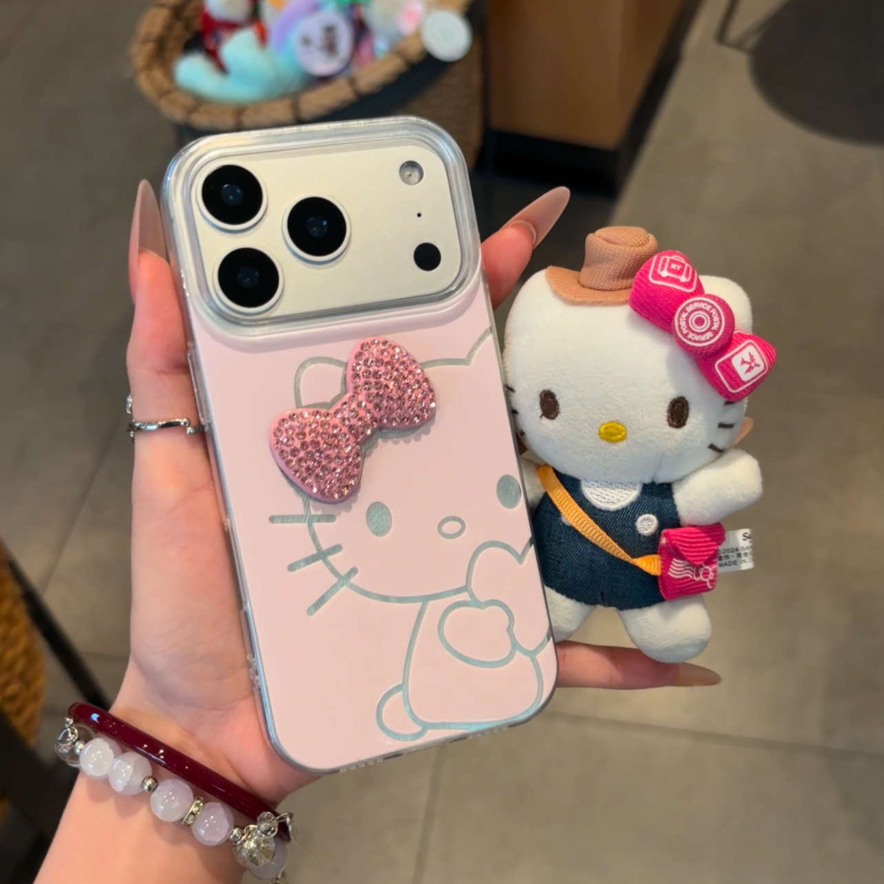 欧克里里抱心kt蝴蝶结适用苹果17/16手机壳华为P70vivo小米15oppo