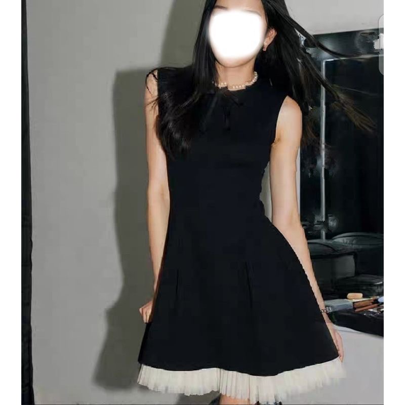 法式气质无袖蝴蝶结黑色收腰拼接连衣裙女夏轻奢圆领A字显瘦短裙