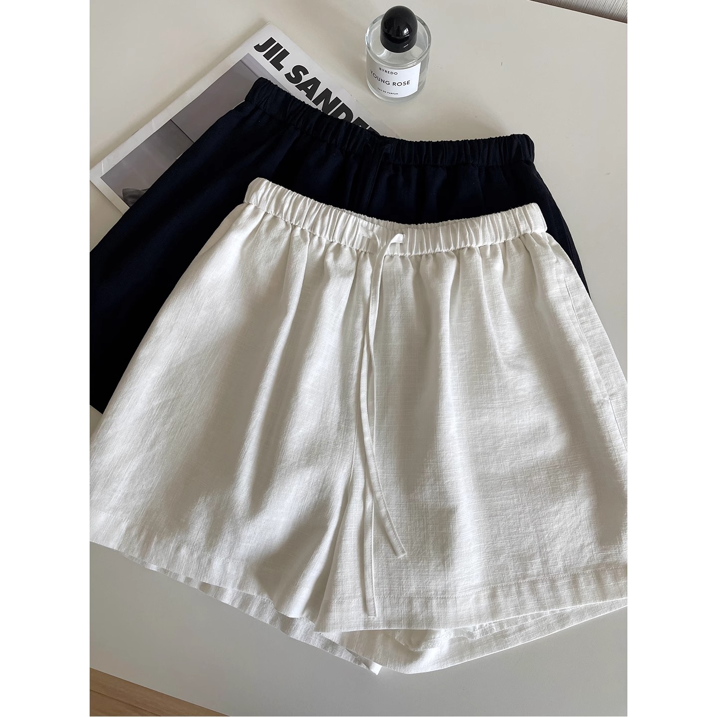 白色水洗棉麻短裤女大码胖mm夏季松紧腰抽绳小个子a字阔腿三分裤