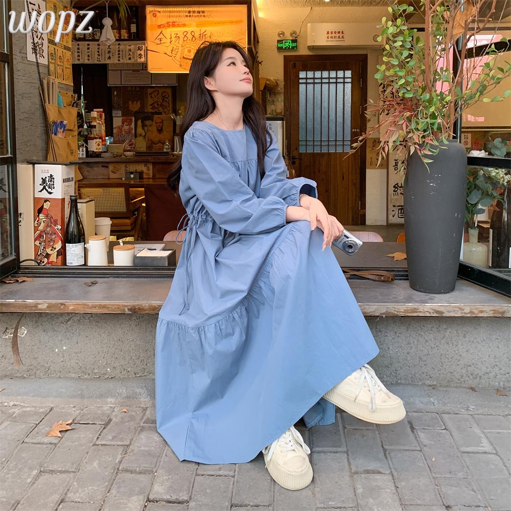 蓝色收腰连衣裙女春秋2025新款高级感法式桔黑色中长款连衣裙