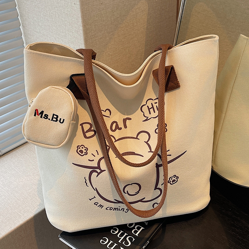 今年流行帆布包包女士2025新款大容量单肩包上班托特包上课通勤包