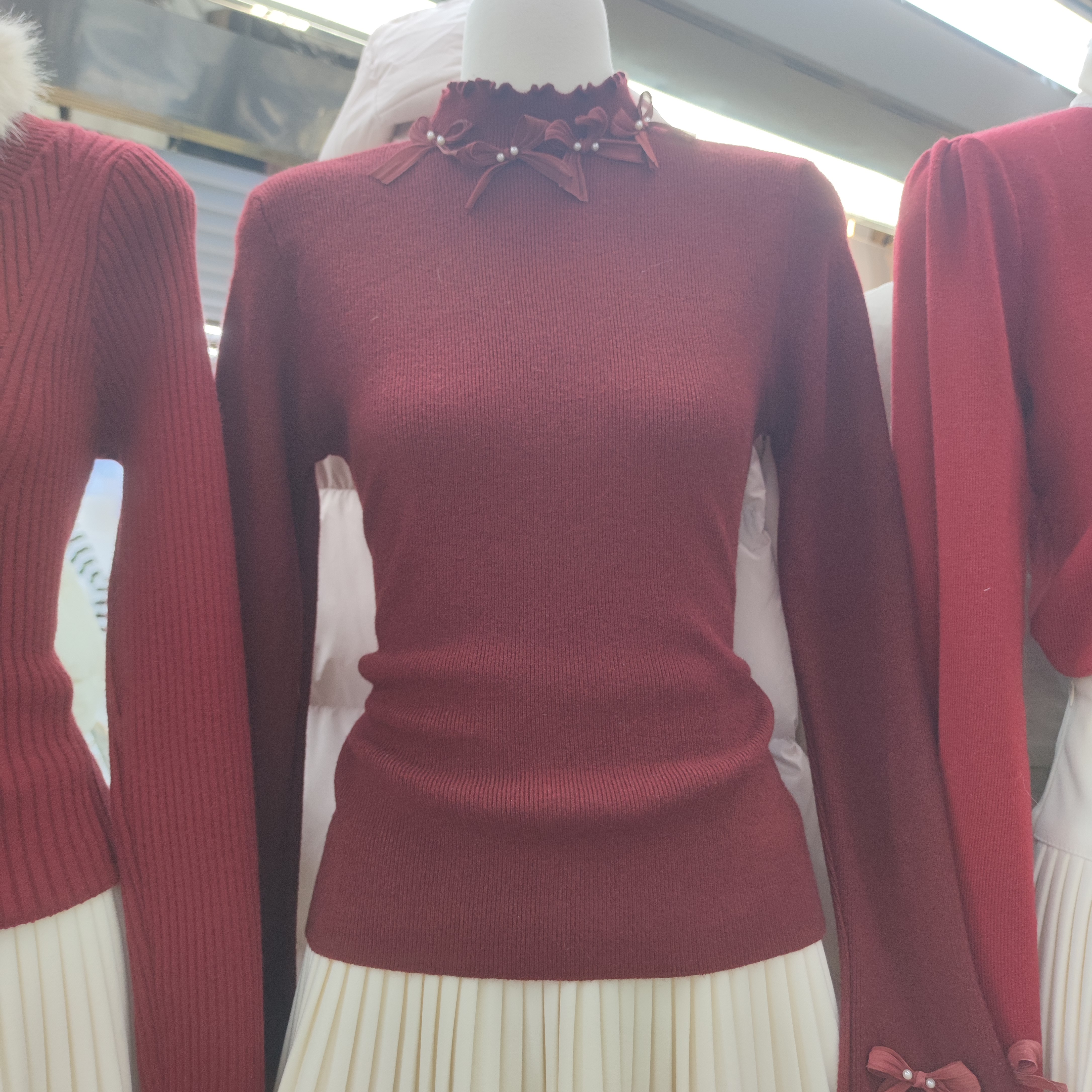 822新款法式气质甜美高级显瘦中高领蝴蝶结设计喇叭袖针织上衣