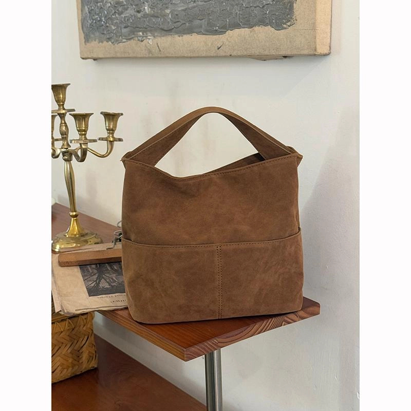 麂皮绒面手提水桶包女式2024秋冬新款大容量单肩托特包通勤斜挎包