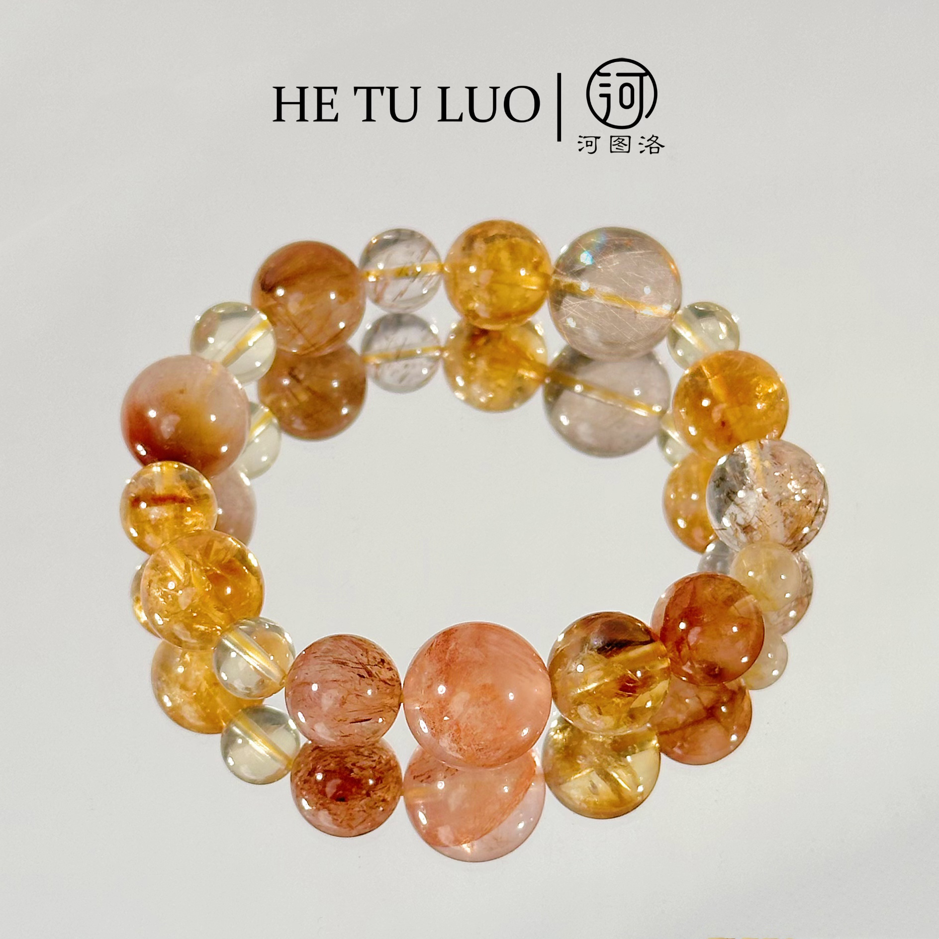 河图洛·「腰缠万贯」金发晶兔毛黄水晶胶花水晶手串【多样性发其一