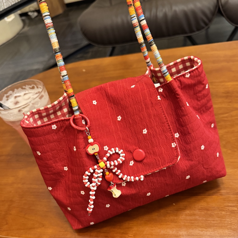 新款包包大容量红色单肩2025百搭韩版波点通勤休闲褶皱托特