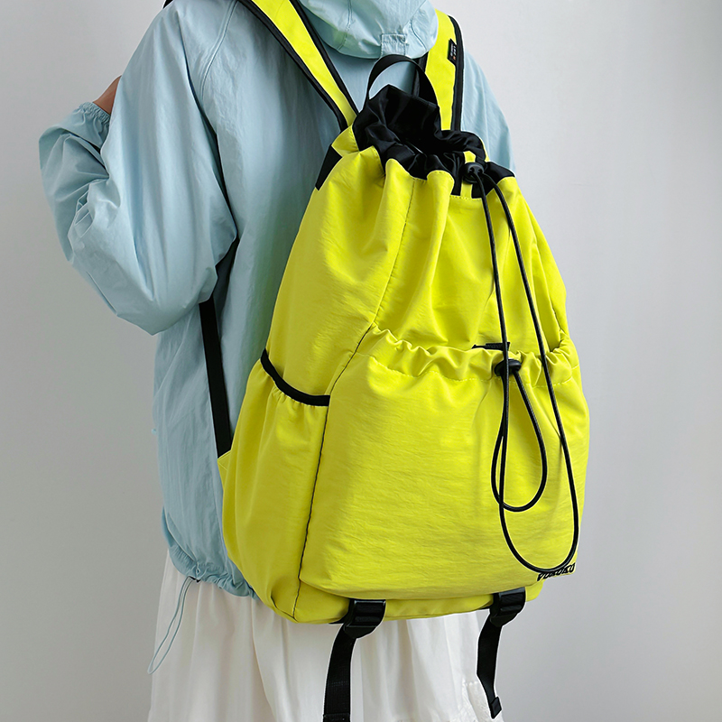 户外运动双肩包男女款轻便防水抽绳包学生上课包徒步旅行通勤背包