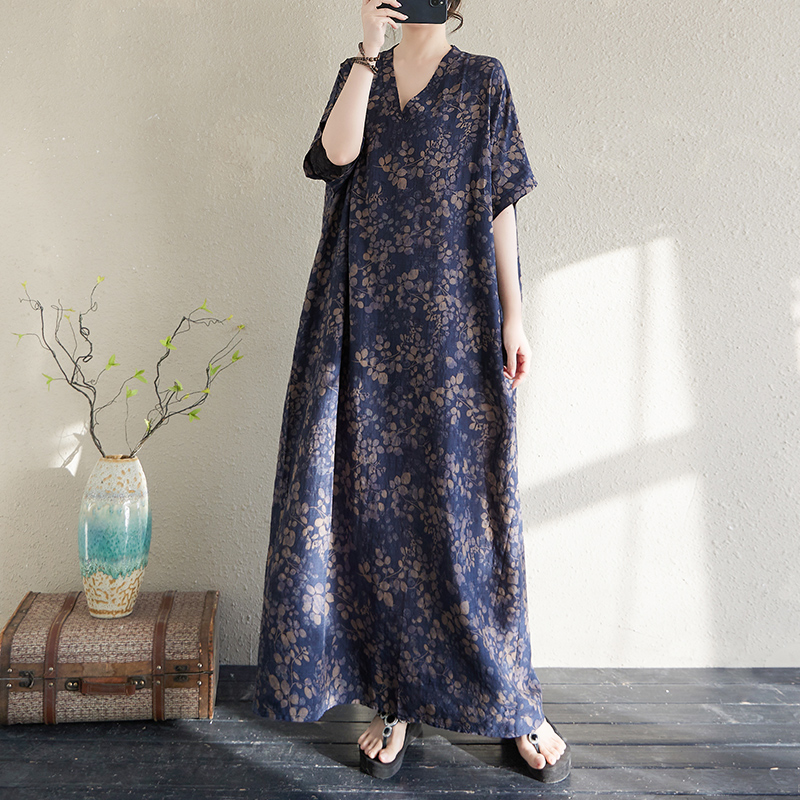 高端减龄女2025夏季款棉麻印花V领宽松大码连衣裙简约度假风长裙