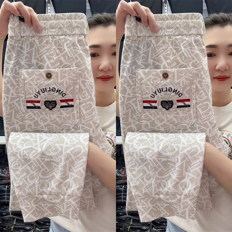 高端夏季薄款速干冰丝休闲裤男士印花束脚裤百搭透气牛奶丝哈伦裤