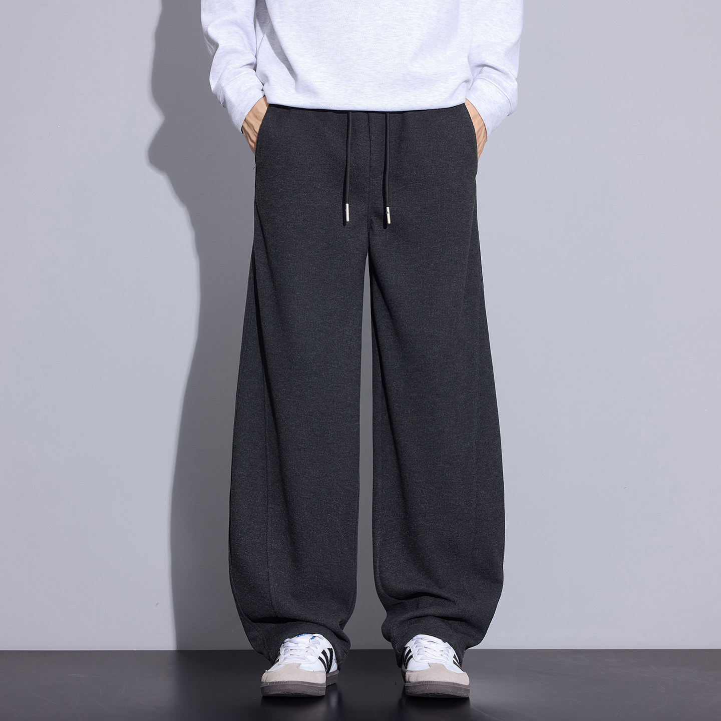 Kuvine2025秋冬季高端简约风羊毛保暖宽松小弯刀时尚百搭休闲裤男