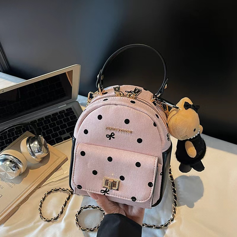 艾米兔女包2025新款斜挎波点质感蝴蝶结简约百搭轻便手提包双肩包