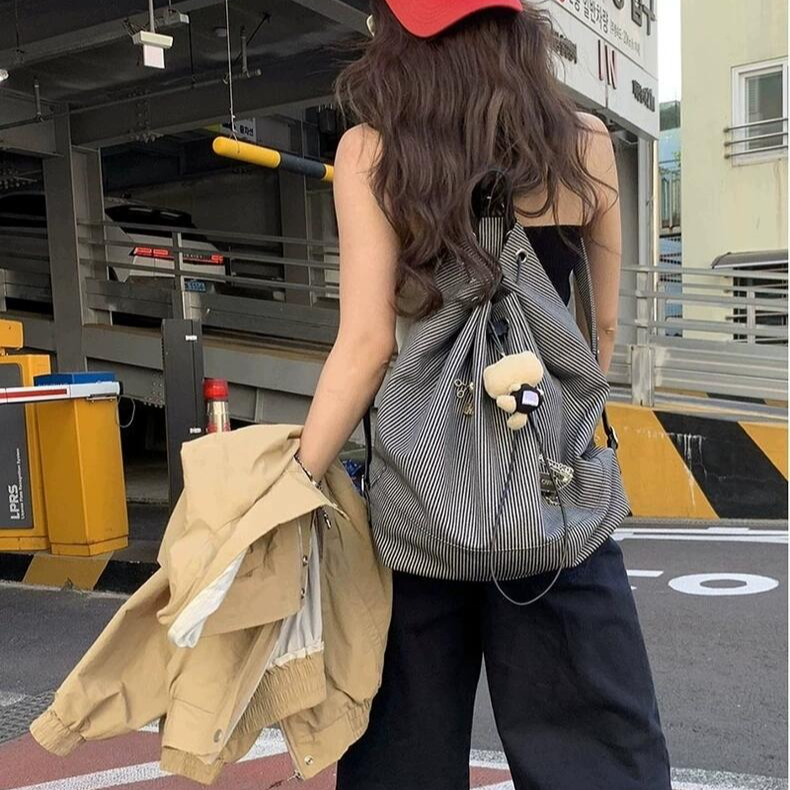 韩系帆布条纹通勤双肩包男女抽绳大容量旅行背包简约休闲轻便书包