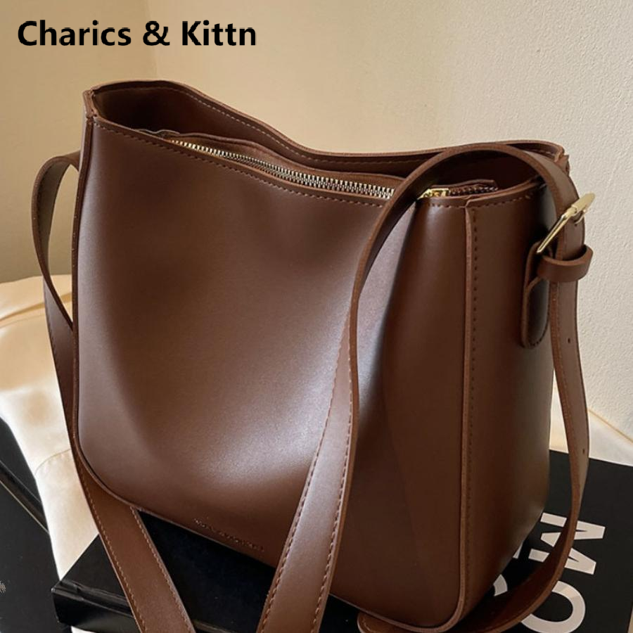 Charics&Kittn包包女2025新款秋冬大容量高级感水桶包真皮斜挎包