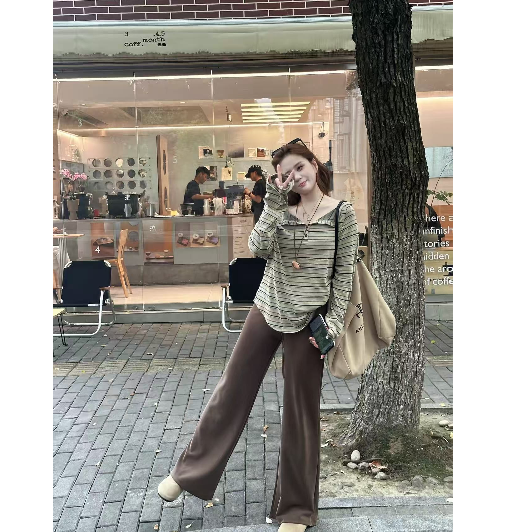 复古条纹露肩长袖女2025秋冬新款设计感休闲T恤宽松显瘦上衣