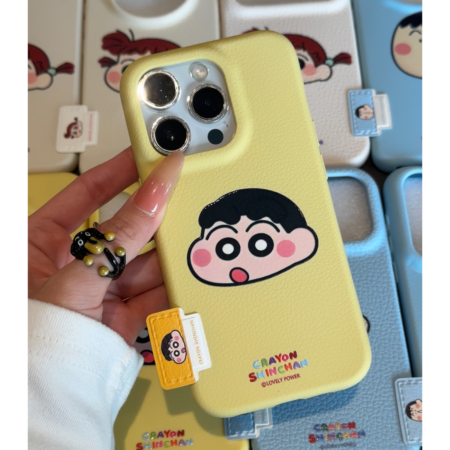 欧克里里小新妮妮标签适用苹果17/16皮纹手机壳华为vivo小米oppo