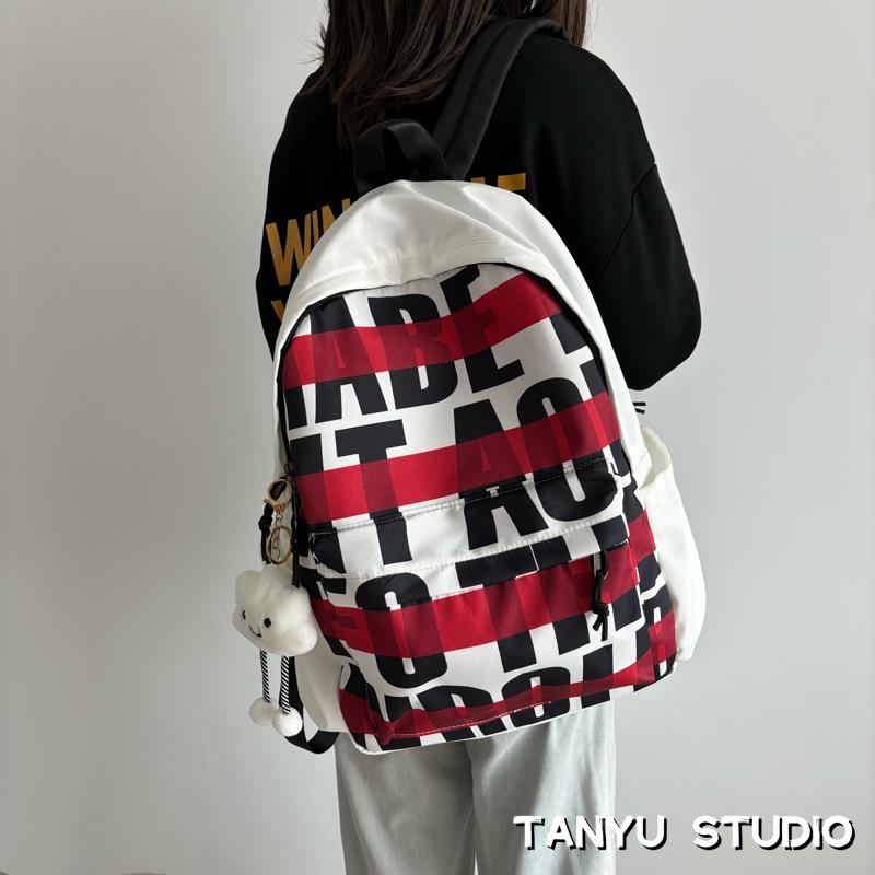 探屿韩版少女双肩包轻便字母学生书包日系新款大容量旅游电脑背包