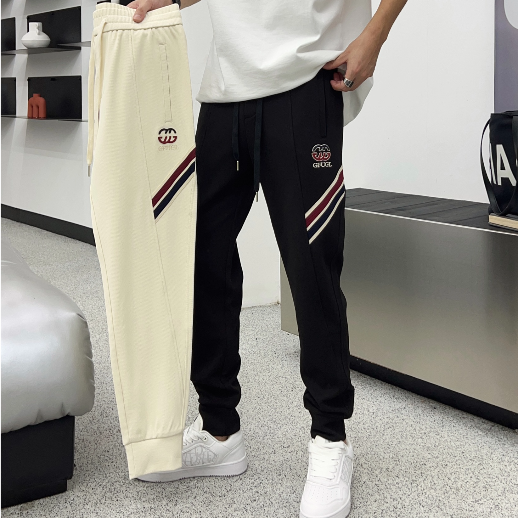 秋冬轻奢痞帅男装高品质休闲裤男款束脚修身时尚百搭织带刺绣长裤