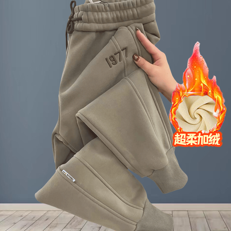 2025冬季新款时尚刺绣拼接加绒加厚哈伦裤女遮肉显瘦时尚洋气卫裤