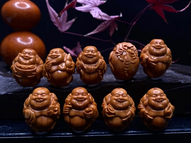 弥勒 尺寸2.2*2.7cm 舟山橄榄核雕纯手工雕刻文玩手串