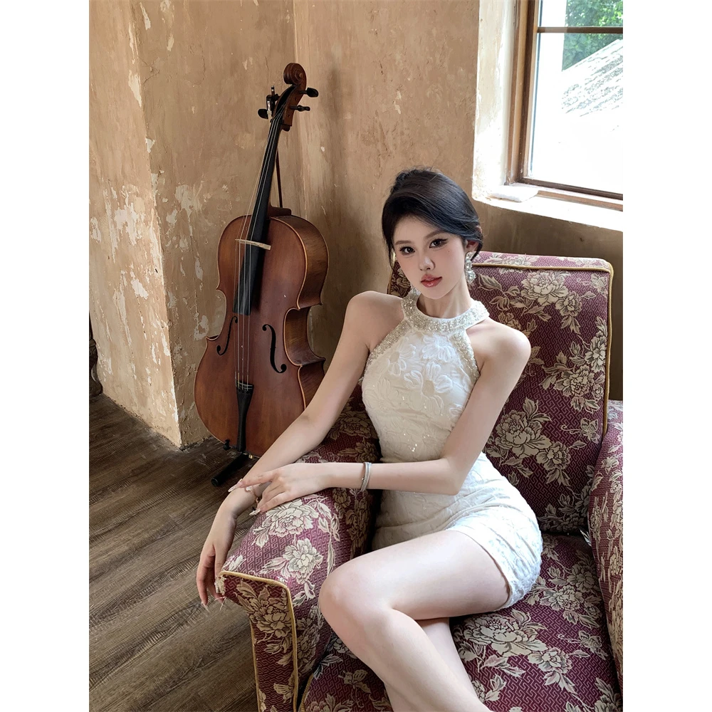 法式气质名媛重工挂脖连衣裙夏季2025新款无袖修身显瘦包臀短裙女