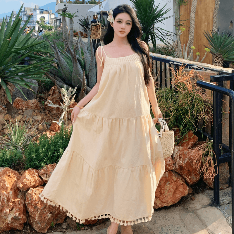 2041串珠流苏绑带连衣裙海边度假风吊带裙宽松遮肚子显瘦a字长裙
