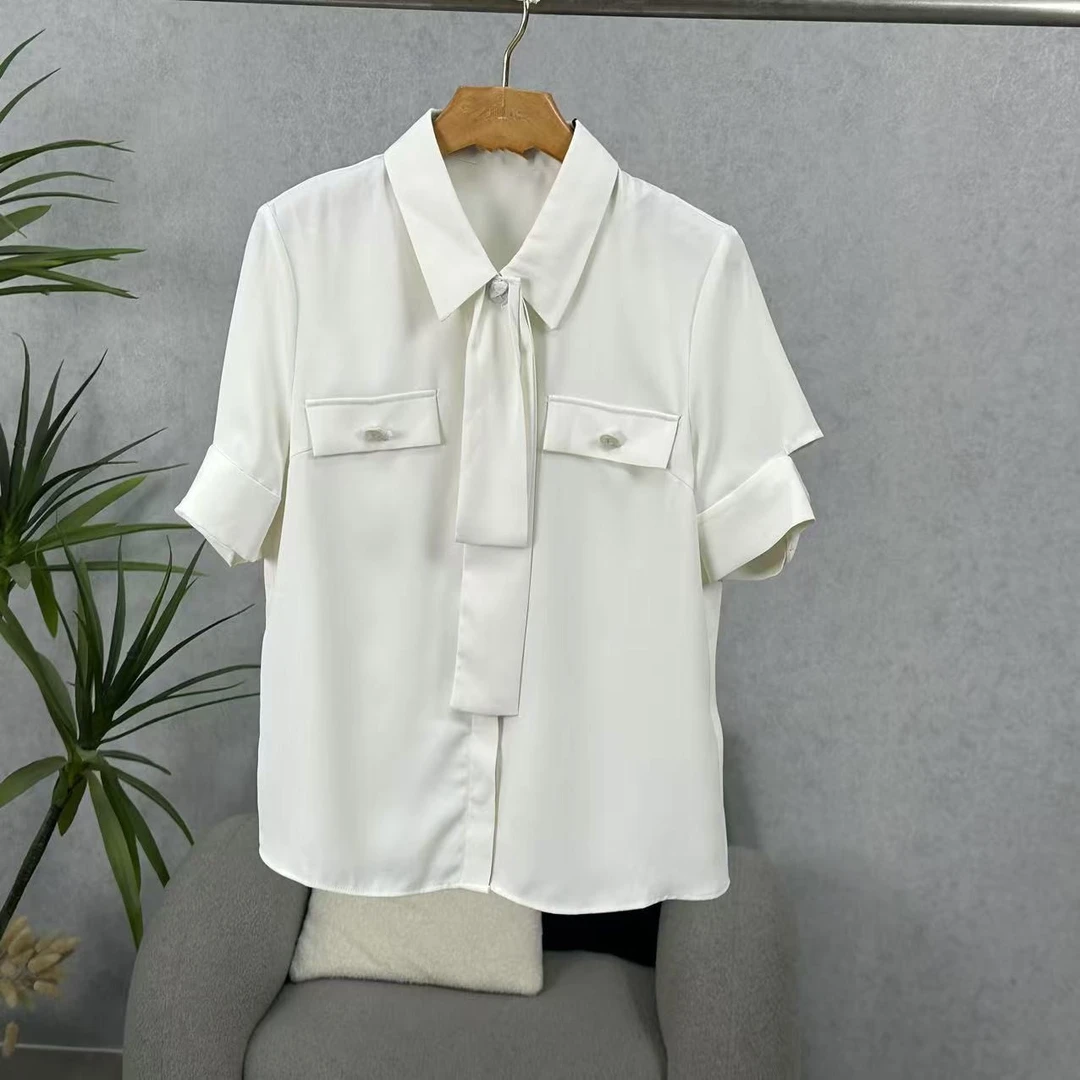 LI丽系列  Z1423   女装时尚撤柜短袖衬衫白色W42416011