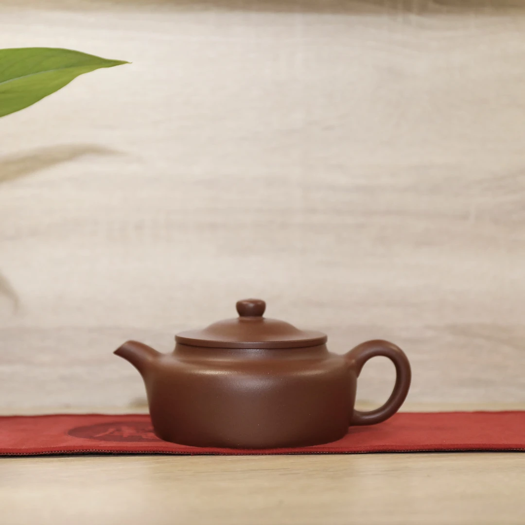 宜兴紫砂壶底槽青笠帽壶