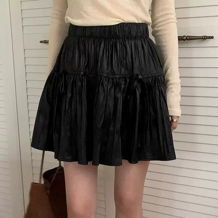 （清仓）大码秋季新款韩系松紧腰高腰短裙仿PU皮褶皱蝴蝶结半身裙