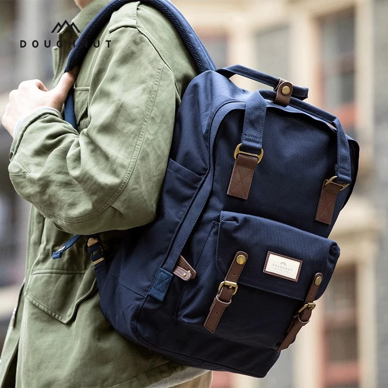 Doughnut【明星同款】甜甜圈男士双肩背包百搭旅行男女学生电脑书