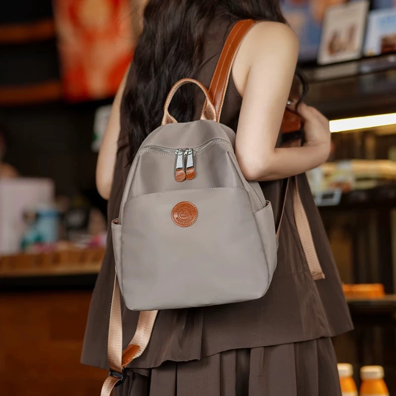 双肩包女2025新款防水牛津布通勤大容量女包轻便时尚百搭旅行背包