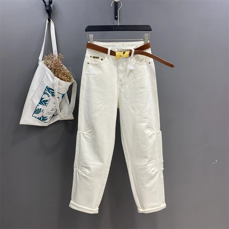 米白磨毛抽褶牛仔裤2023秋冬新款设计感网红热卖弹力款休闲哈伦裤