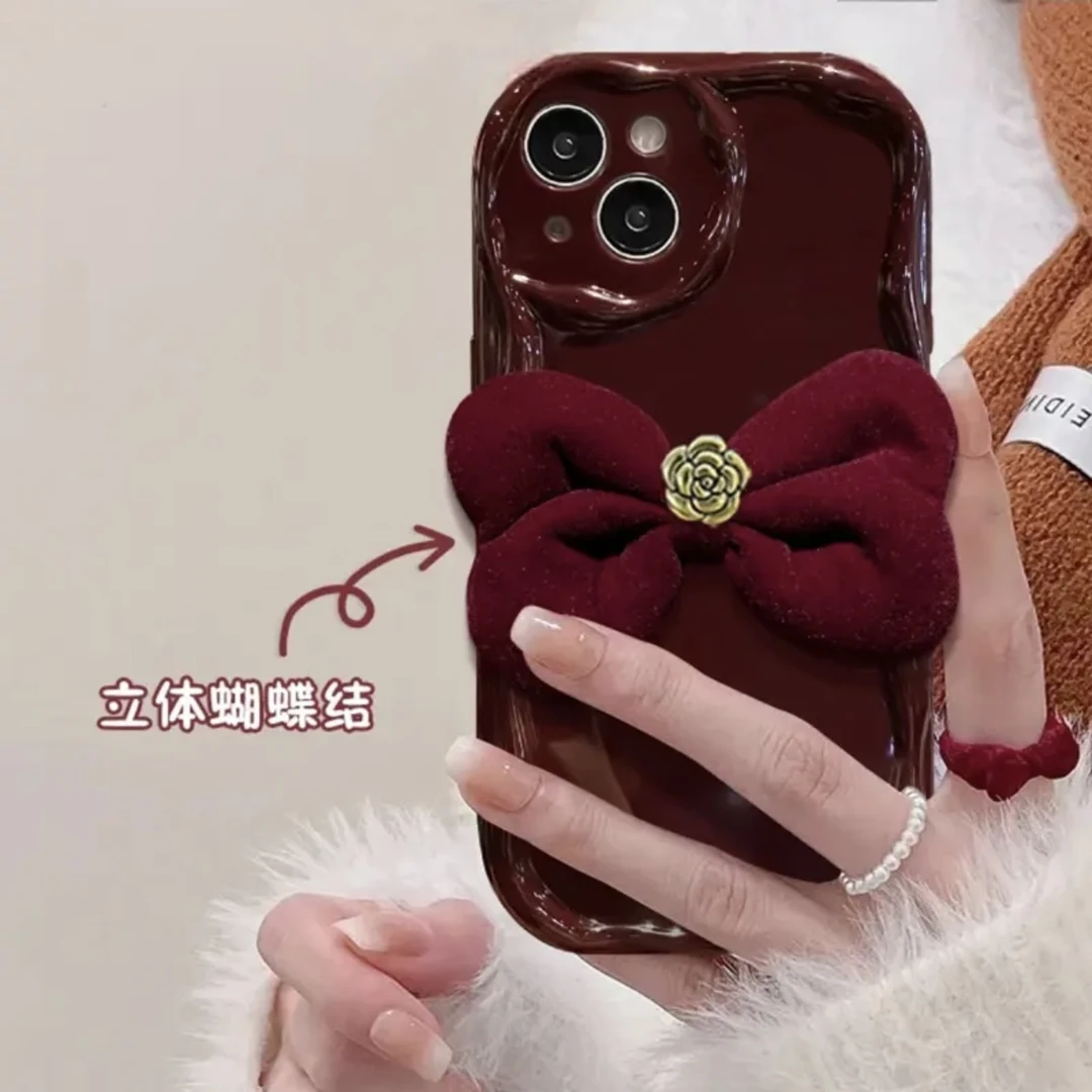 圣诞绒布蝴蝶结适用苹果15手机壳iPhone13/14promax全包12新款11