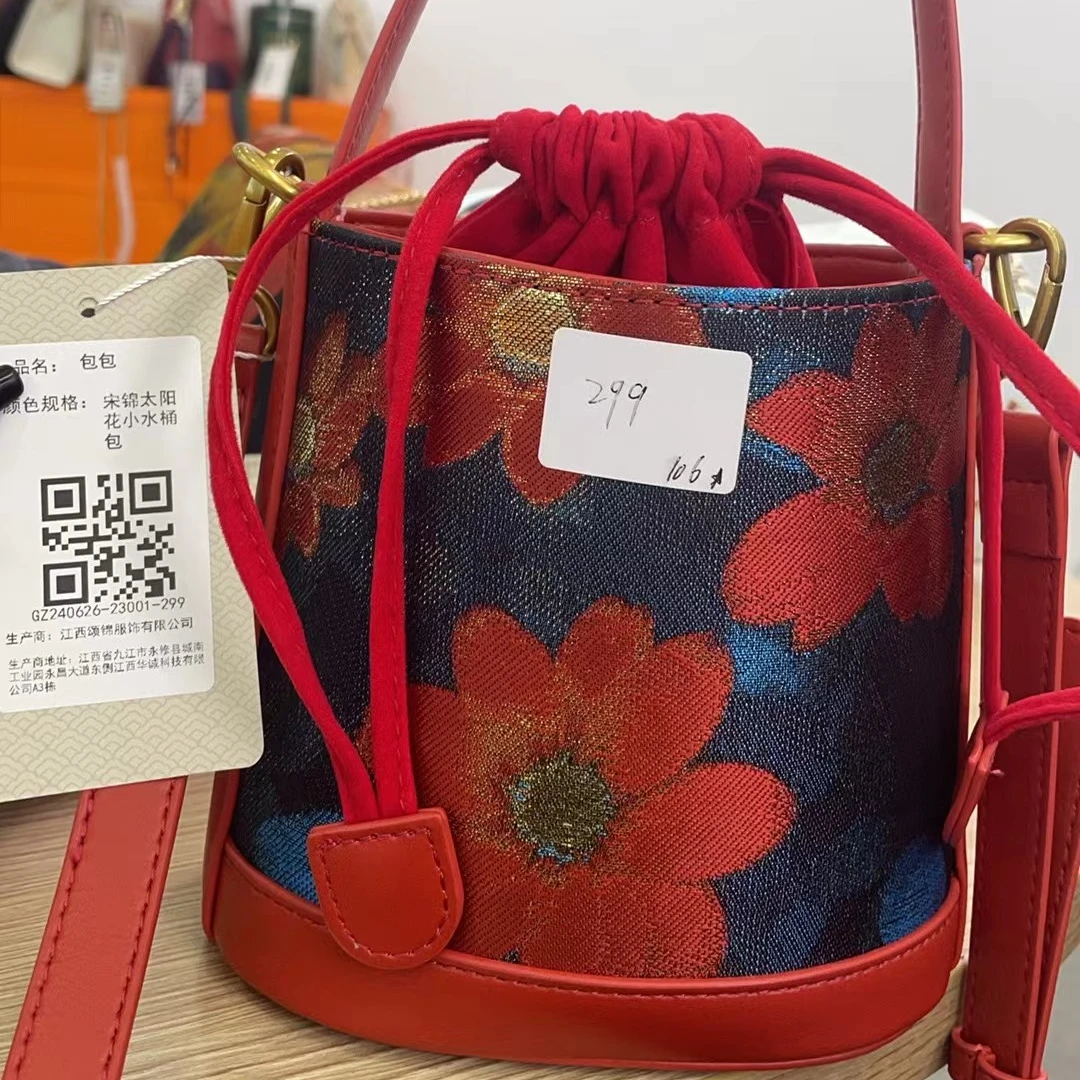 【太阳花小水桶手提包】花位随机民族风气质女手提时尚女包299